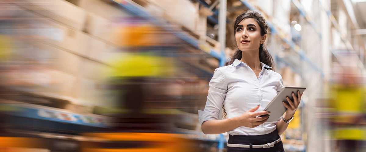 People shaking hands in carpentry workshop